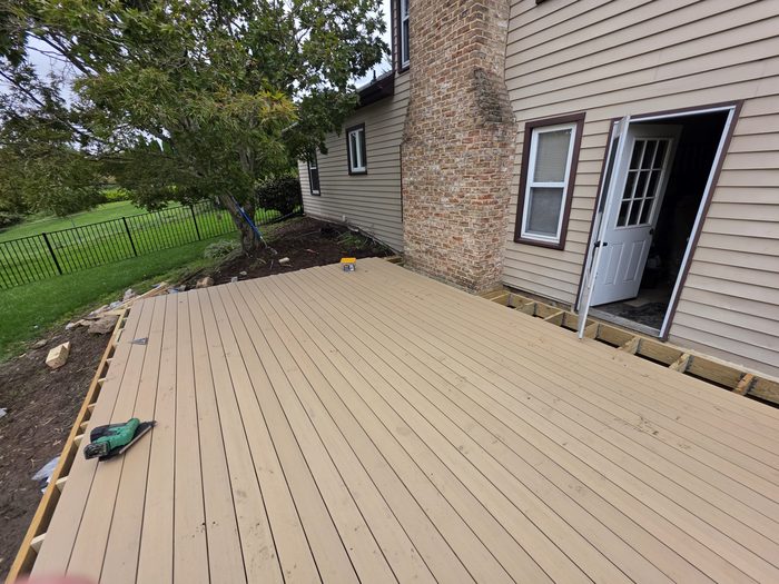 TimberTech Natural White Oak composite decking installed on the new frame, before railing and trim — Hampden Township, PA
