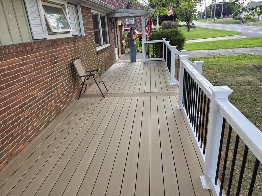 TimberTech Natural White Oak composite deck boards with contrasting border and RDI white vinyl railing, Richland PA